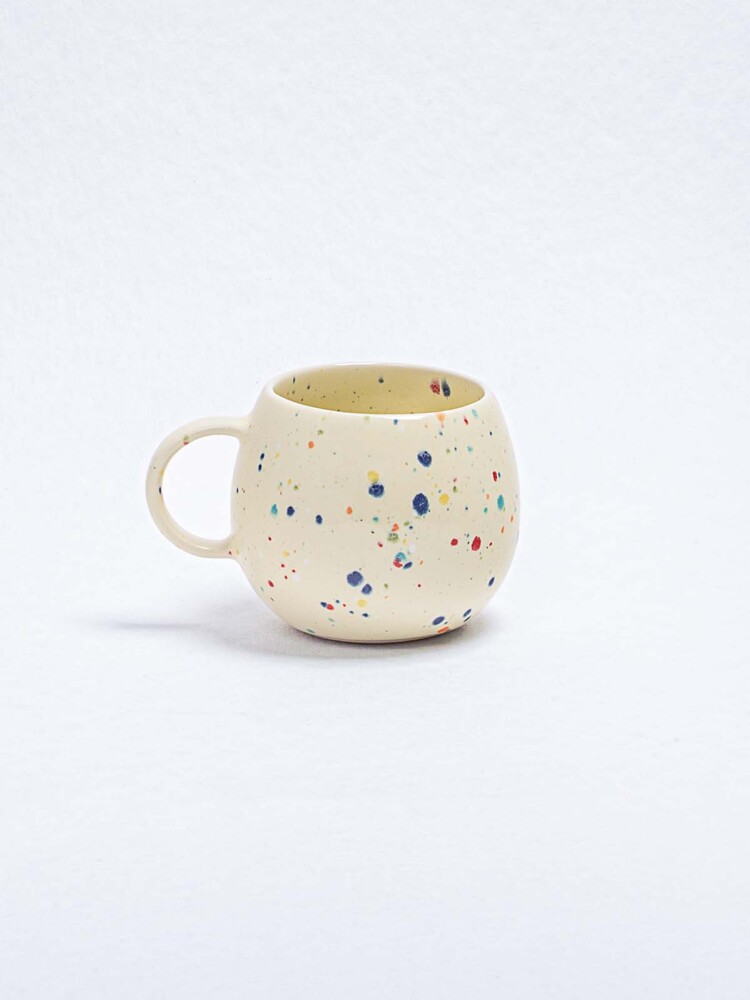 Tasse in hellgelb mit Konfetti - Egg Back Home