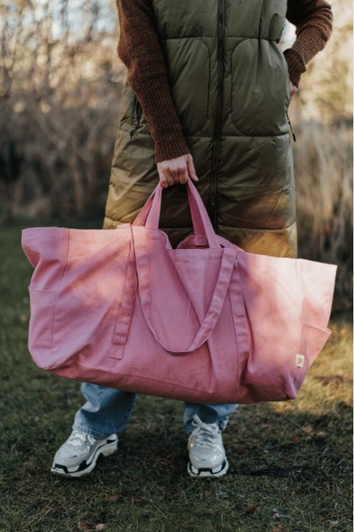 über große Bonbontasche in rosa