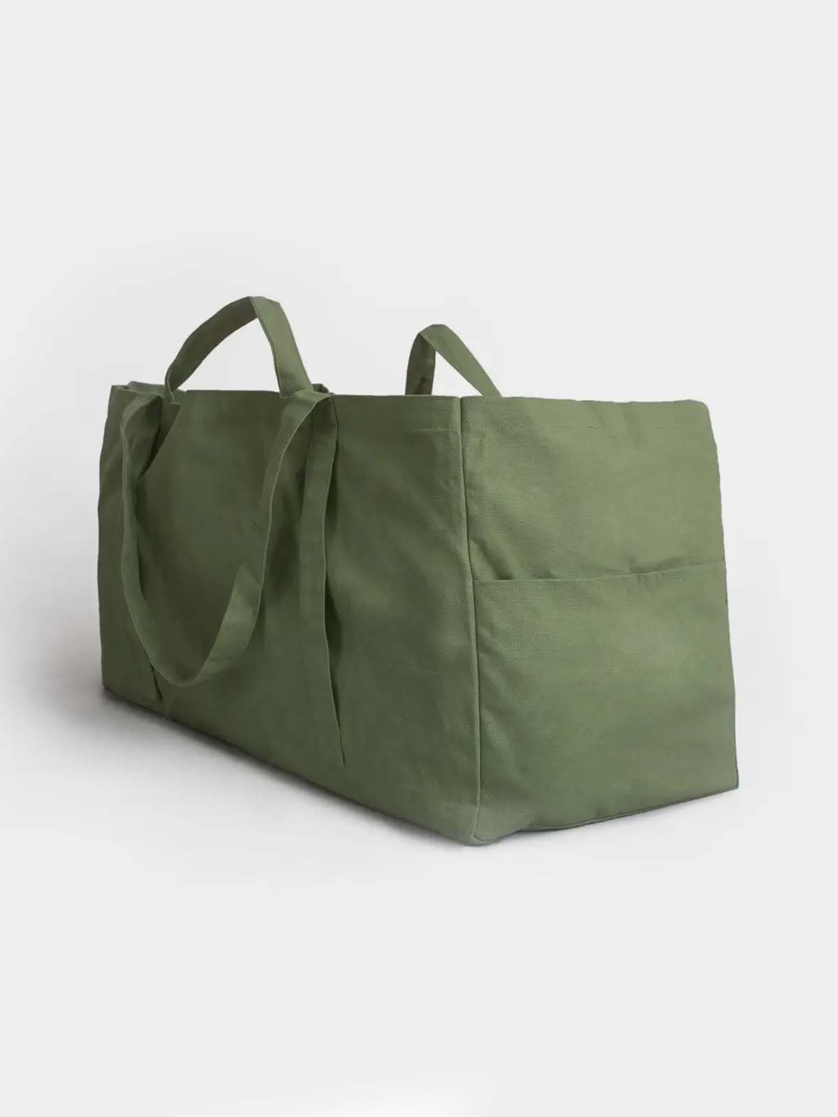 über große Leinwandtasche in grün
